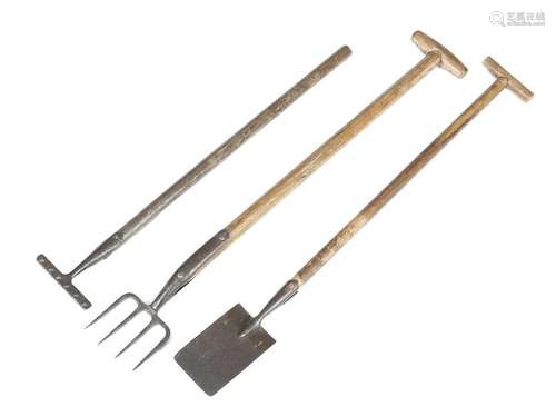 Three child's gardening tools, comprising: a rake …