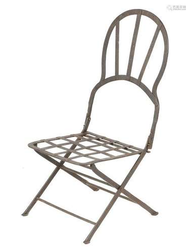 A 19th century iron folding chair, possibly a coac…