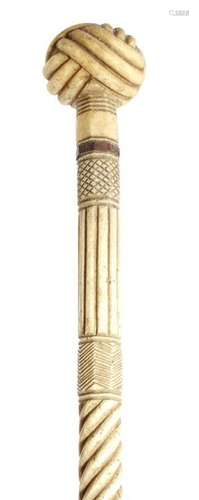 A 19th century sailor's whalebone walking cane, th…