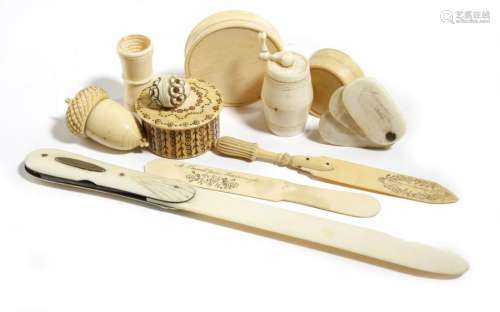 Λ A small collection of ivory items, including: th…
