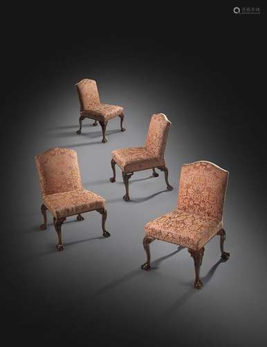 A set of four George II and later walnut side chai…