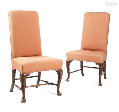 A pair of George II walnut side chairs, each with …