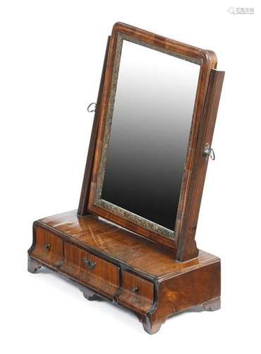 A George II walnut dressing table mirror, the late…