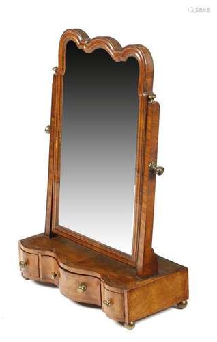 A George II walnut dressing table mirror, with a l…