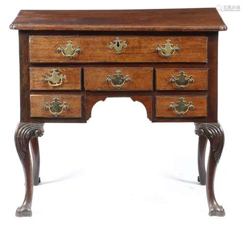 A George II Irish red walnut lowboy, the top with …