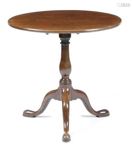 A George III mahogany tripod table, the circular t…