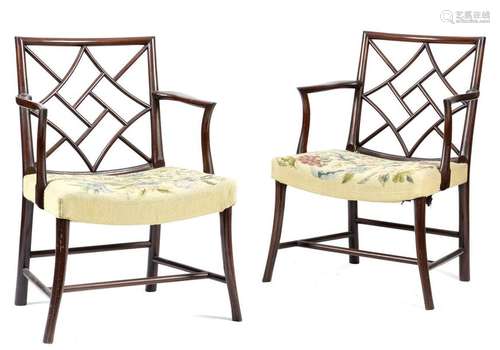 A pair of mahogany cockpen open armchairs in Georg…