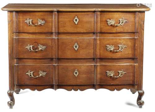 A French Louis XV walnut commode, with three long …