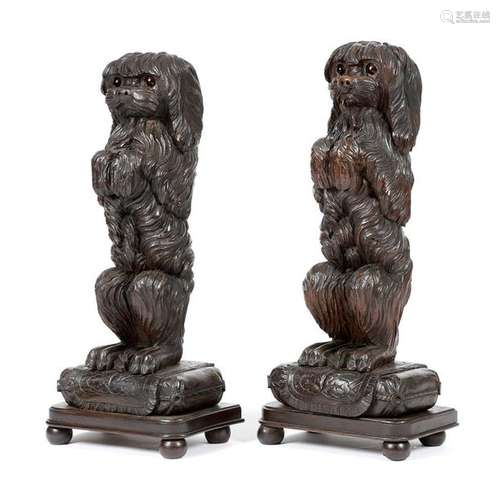 A pair of Black Forest carved wood dog door porter…