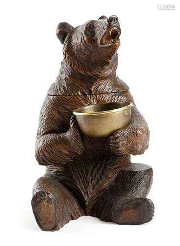 A Black Forest carved wood bear tobacco jar, with …