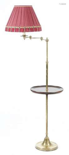 A brass lamp table, with an adjustable arm and ste…