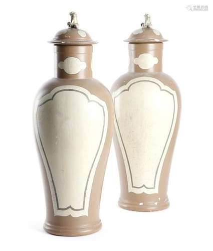 A pair of painted plaster vases and covers in Chin…