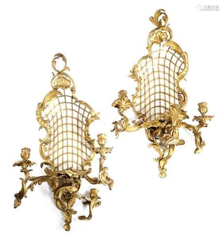 A pair of French ormolu three light wall appliques…