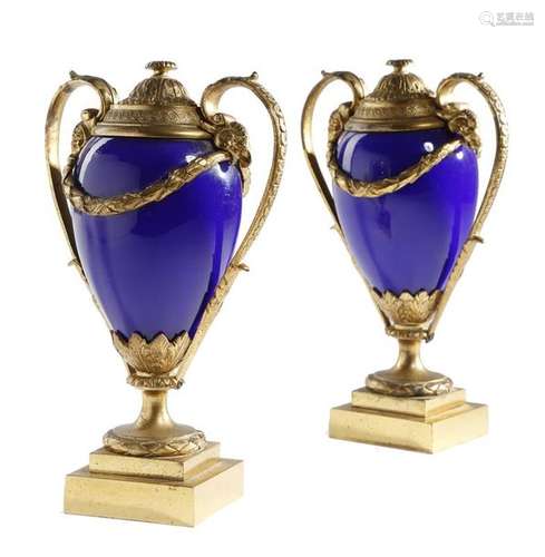 A pair of French bronze and blue porcelain cassole…