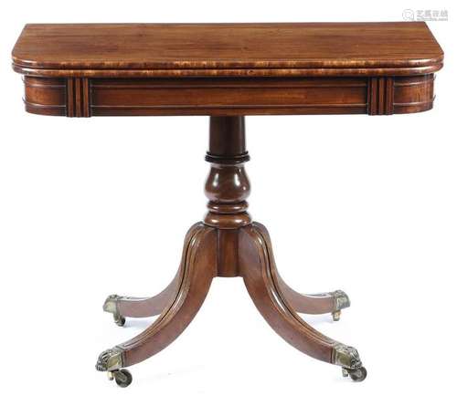 A George IV mahogany card table, the hinged swivel…