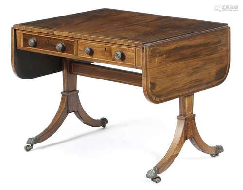 Λ A Regency rosewood sofa table, inlaid with eboni…