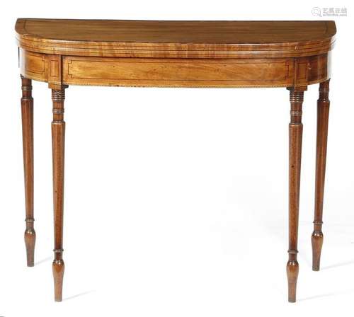 A Regency mahogany card table, inlaid with ebonise…