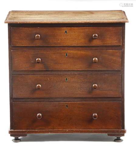 A small 19th century mahogany chest, of four long …