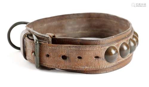 A large brown leather and brass studded dog collar…