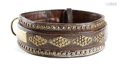 A Victorian brown leather and brass studded dog co…