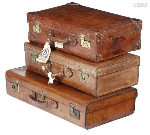 Three brown leather suitcases, one stamped 'ELGIN …