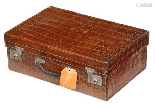 Λ An early 20th century crocodile vanity case, the…