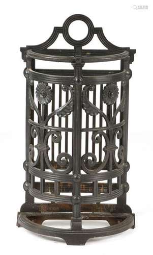 A late Victorian cast iron umbrella stand designed…