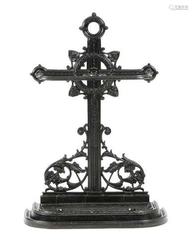 A late Victorian black painted cast iron stickstan…