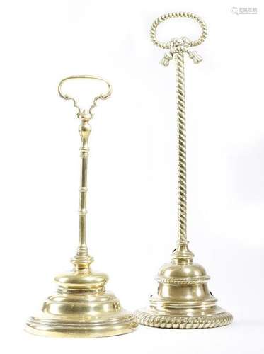 Two Victorian brass bell shape doorstops, one by W…