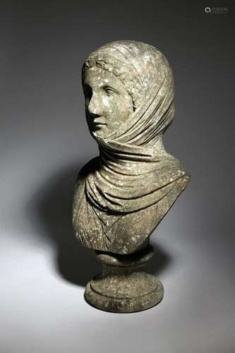 An Italian carved marble bust of the Vestal Virgin…