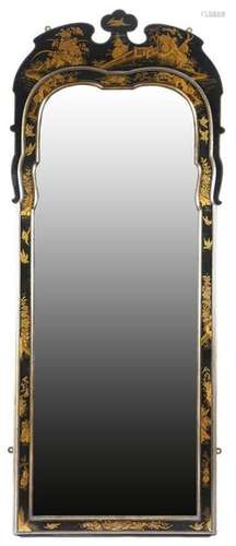 A black japanned pier mirror in Queen Anne style, …