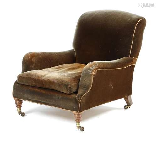 A late Victorian walnut easy armchair by Howard & …