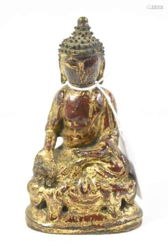 Bouddha en bronze doré et patiné (Ht.16cm)