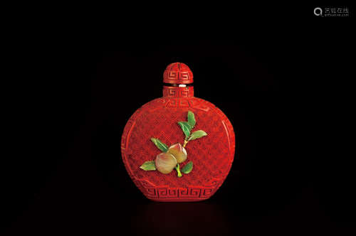 A CINNABAR JADE INLAID SNUFF BOTTLE