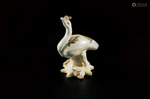 A PORCELAIN GOOSE