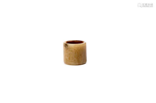 A JADE THUMB RING CARVING OF POEMS