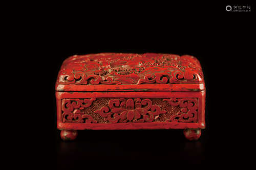 A CARVED CINNABAR BOX METAL BASE