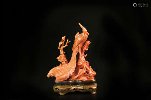 A CARVED CORAL STATUE