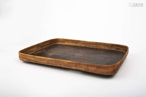 A BAMBOO WOVEN WOODEN TRAY