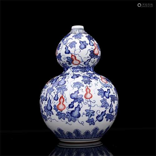 A Chinese Iron-Red Glazed Blue and White Porcelain Double Gourd Vase