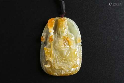 A Chinese Carved Jadeite Pendant