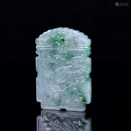 A Chinese Carved Jadeite Pendant