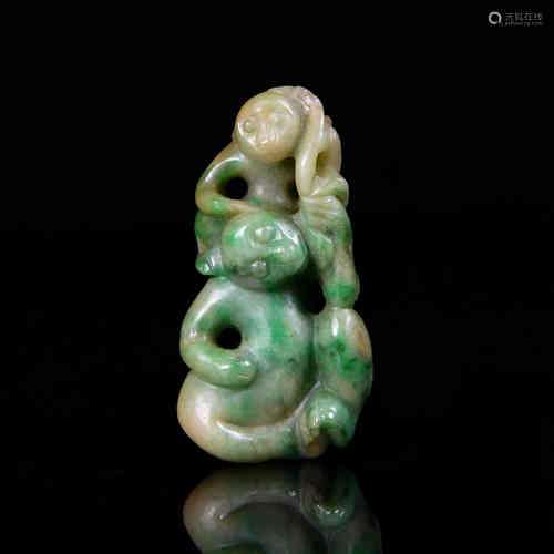 A Chinese Carved Jadeite Pendant