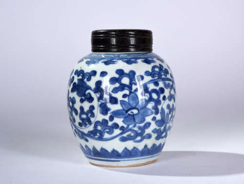 A BLUE AND WHITE FLORAL JAR, KANGXI PERIOD