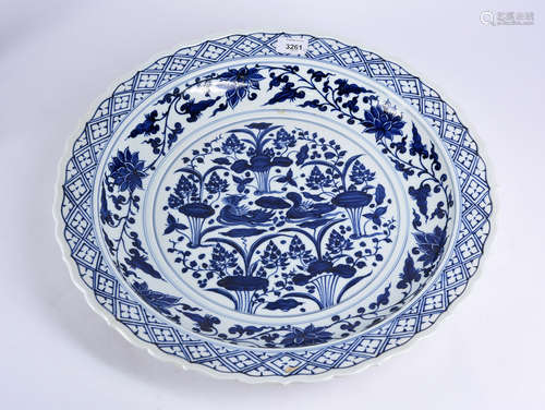 A BLUE AND WHITE PLATE