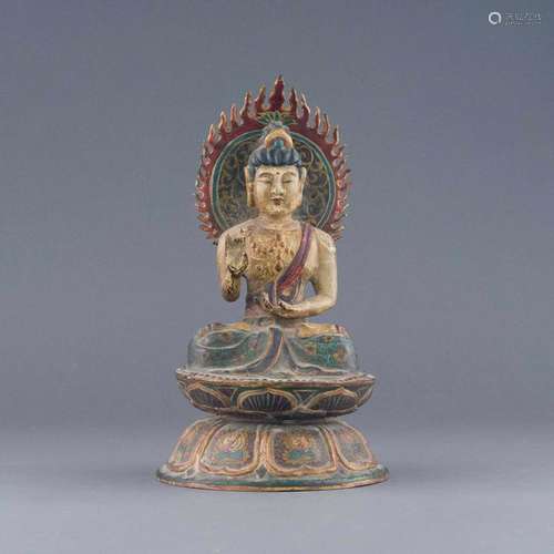 TANG PAINTED GILT BRONZE SEATED BUDDHA WITH AUREOLE