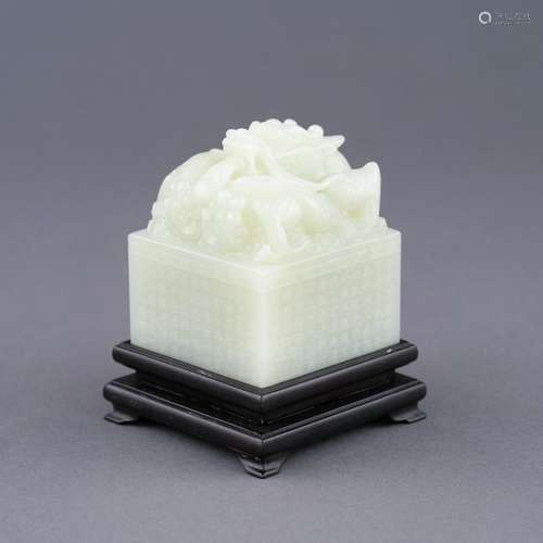 WHITE JADE CARVED DRAGON SEAL ON STAND