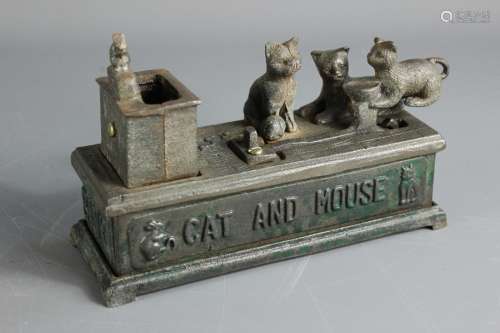 Vintage 'Cat and Mouse' money box, approx 19 x 7 x 13 cms, most of the enamel has worn off over time
