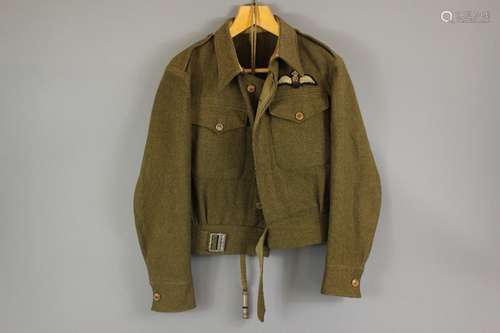 Two WWII RAF Battle Dress Blouses, one Airforce Blue with label Montague Burton Ltd dated 1943 with broad arrow mark and a Khaki Olive Drab with label A