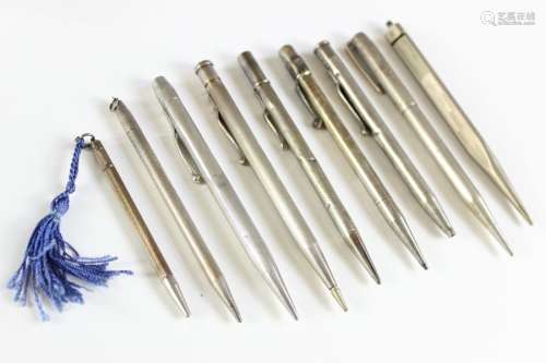 Nine vintage silver propelling pencils, the majority 'Yard o Led'